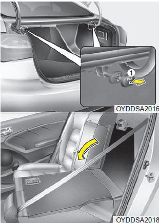 5.Pull the lock release lever (1) and fold the rear seatback forward and down